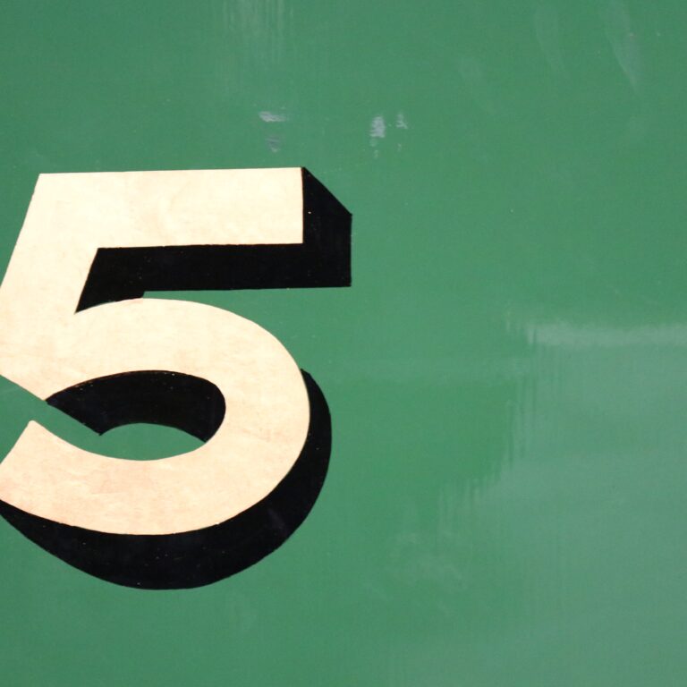 the number 5 on a green background for 5 reasons starting a podcast is still a good idea